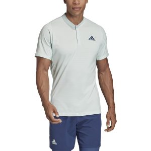 Model in Adidas Men's HEAT.RDY FreeLift Dash Green Tennis Polo