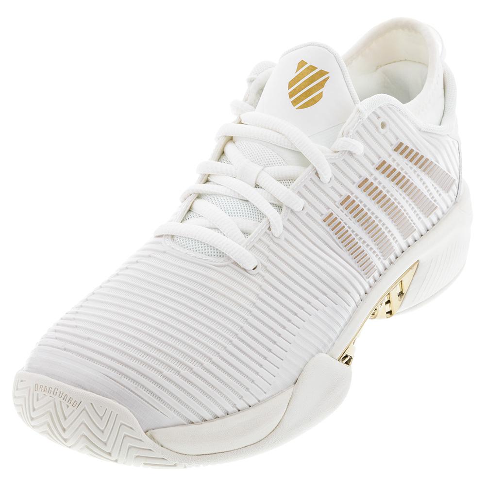 white and gold tennis shoes