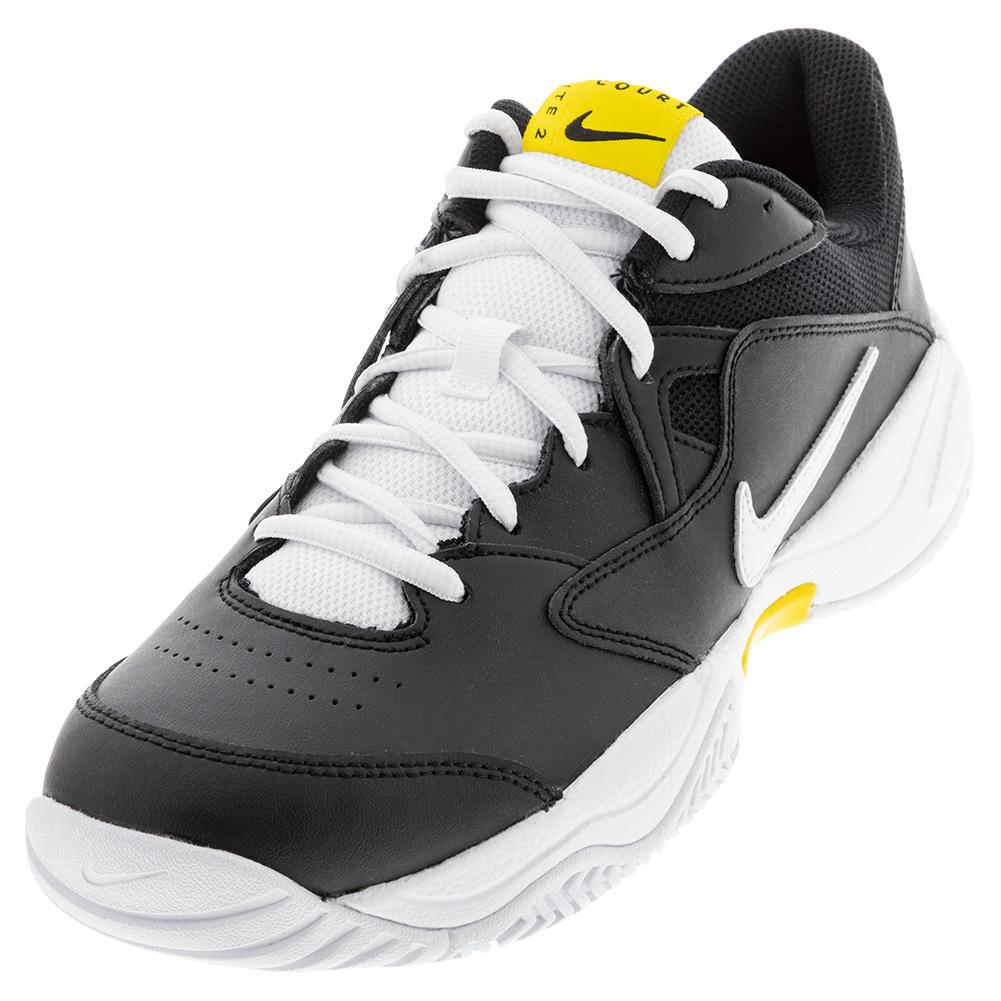 black and yellow nike tennis shoes