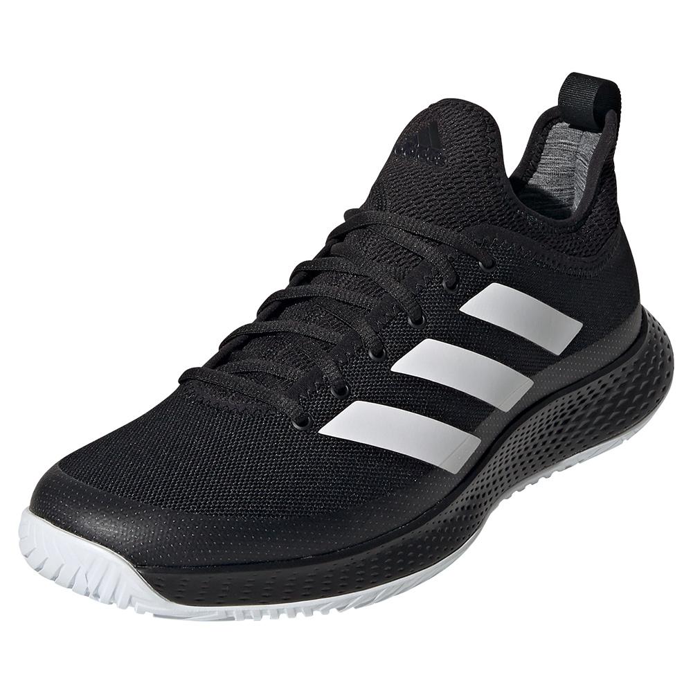 white and black adidas tennis shoes